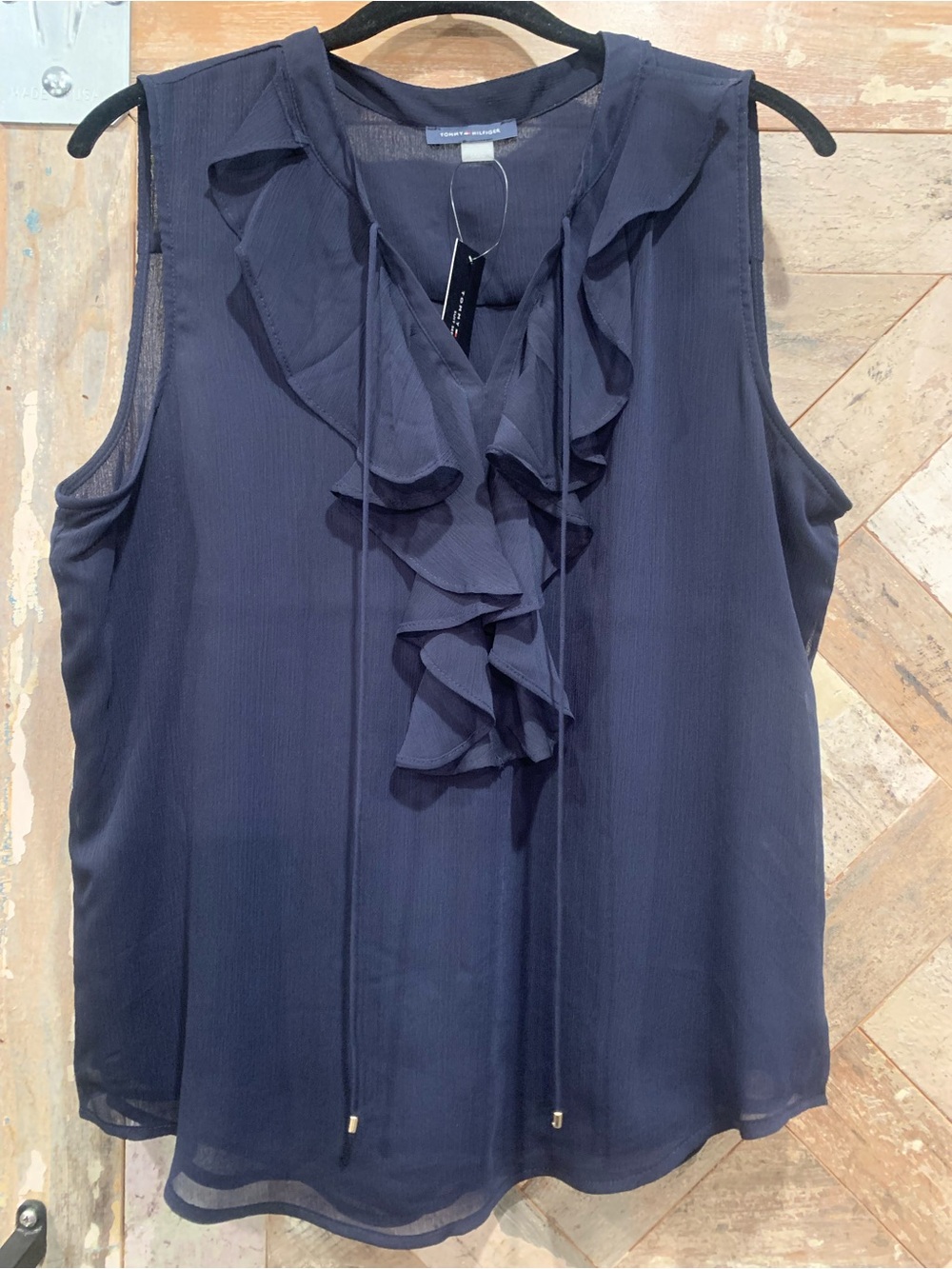 Tommy Hilfiger navy blue sleeveless blouse with ruffles. Size  Large